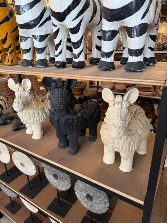 Global Curated – Hand-Carved Artifacts