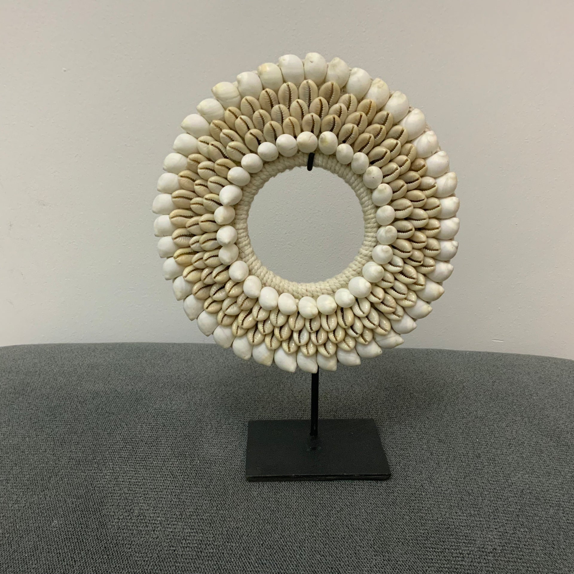 The Serene Cowrie Shell Mandala on Stand