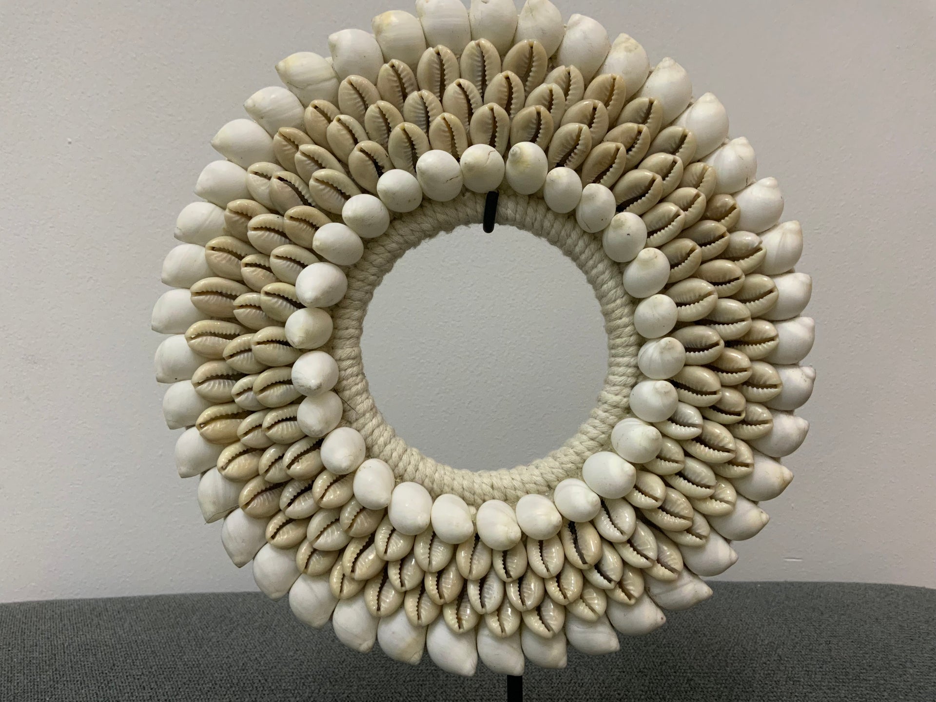 The Serene Cowrie Shell Mandala on Stand