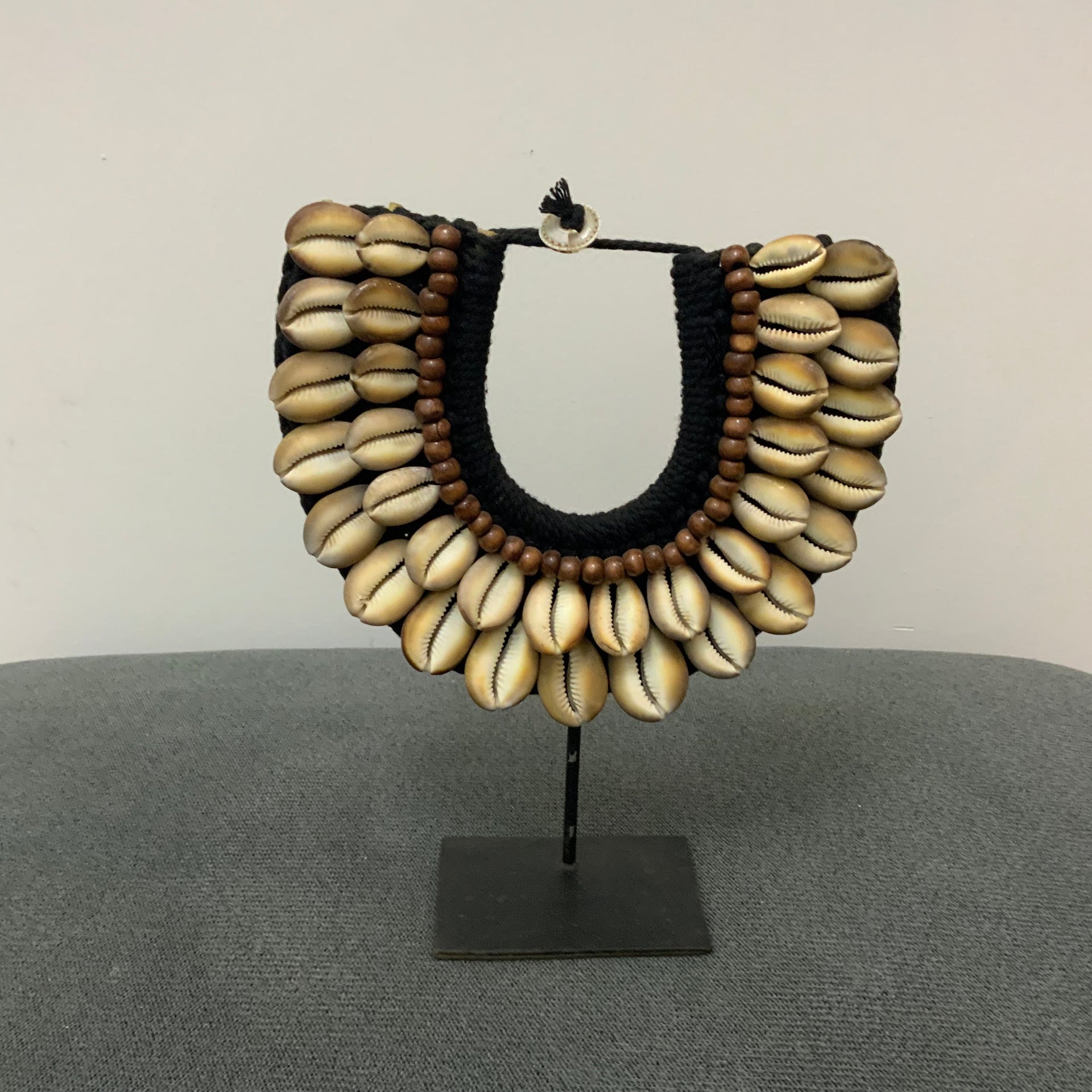 The Obsidian & Amber Cowrie Statement Necklace on Stand